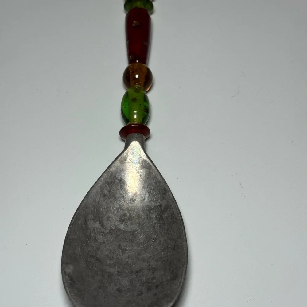Vintage Silver Spoon with Red and Green Accents‎